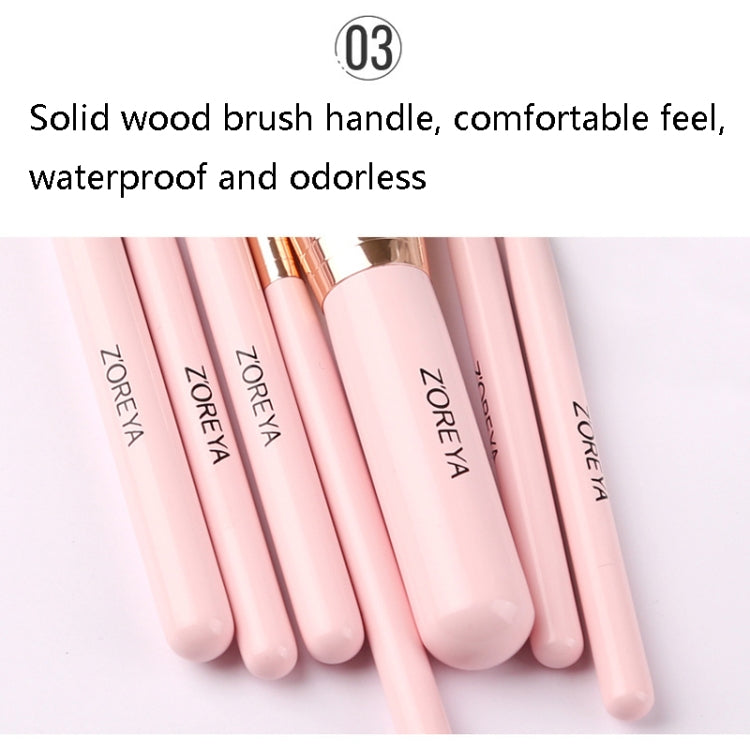 Pink makeup brush handles with ZOREYA print and brown bristles