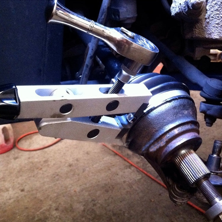 Cage clamp pliers attached to a ball joint area for dust cover work