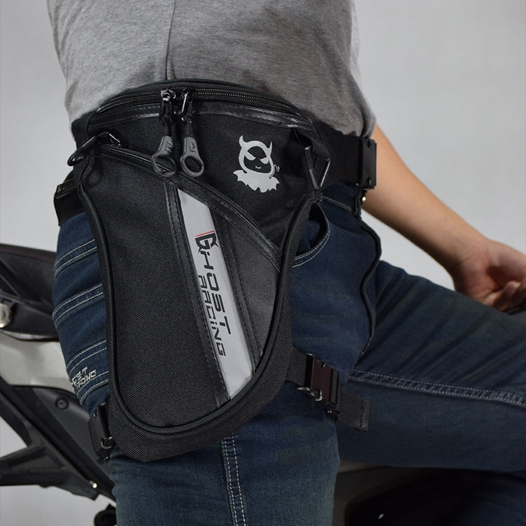 Black motorcycle leg bag worn on thigh with adjustable leg strap and front zipper