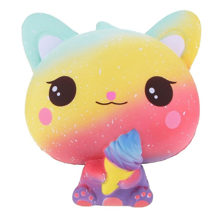 Scented squeeze cat toy, yellow-pink gradient with big eyes and blue swirl tail.