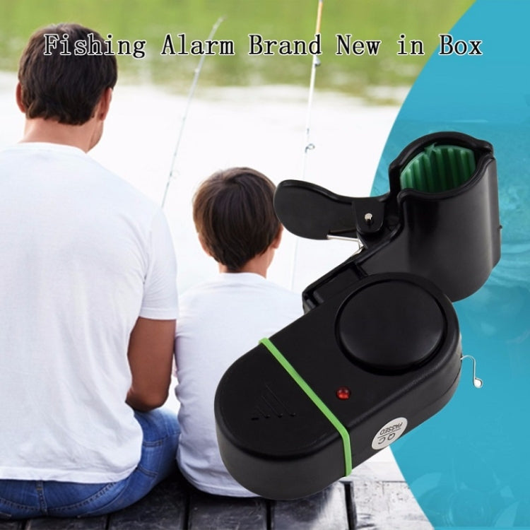 Black electronic fishing rod alarm with hinged clamp and green indicator light
