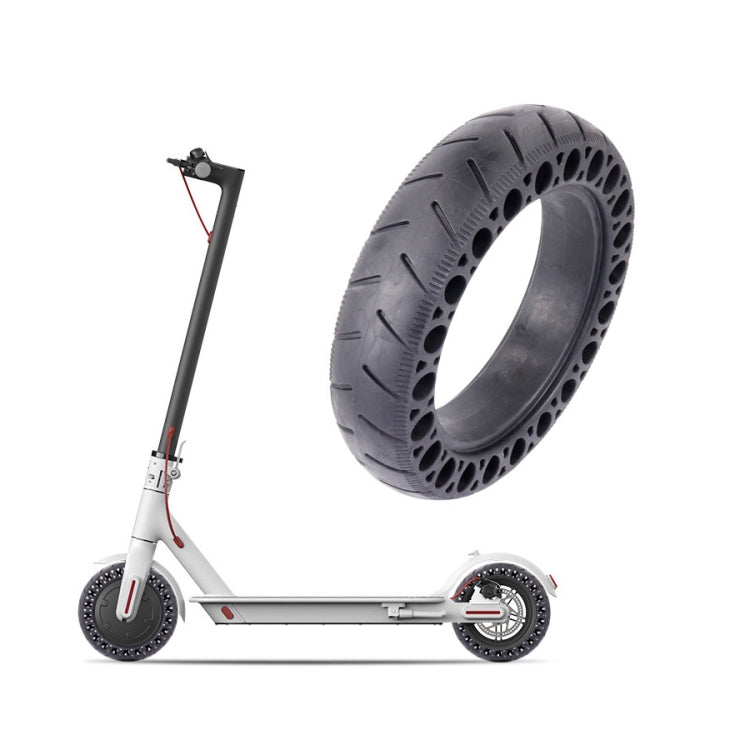 9.5-inch black honeycomb solid scooter tire mounted on wheel