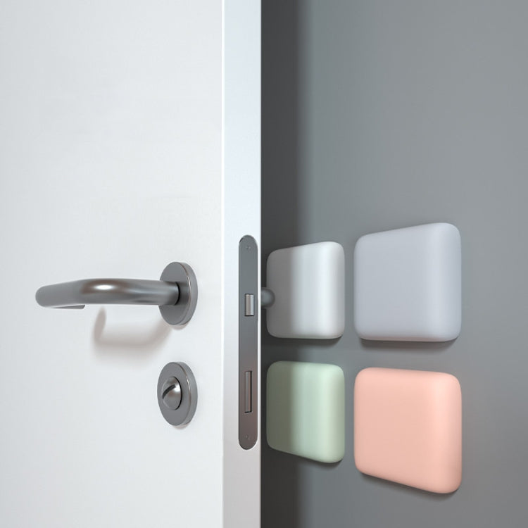 Set of silicone anti-collision door handle pads, square shapes in white, gray, green, and pink