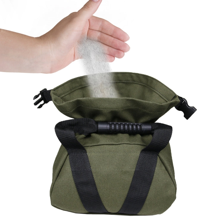Olive canvas weight sandbag with black straps, top flap opened by hand