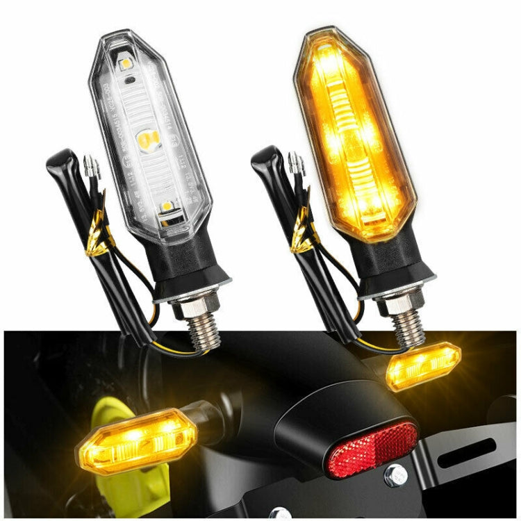 Two shark-style motorcycle LED signal lamps with amber light, black mounts, and cables