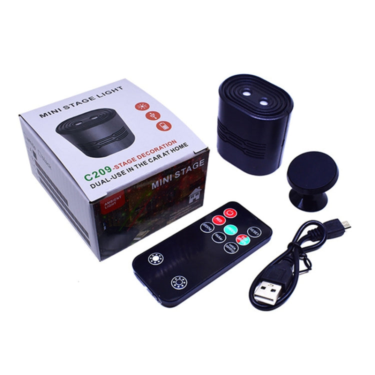 Mini stage light kit with black unit, remote control, and USB charging cable