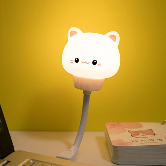 Cat-shaped plug-in night light with glowing white face and cute whisker details