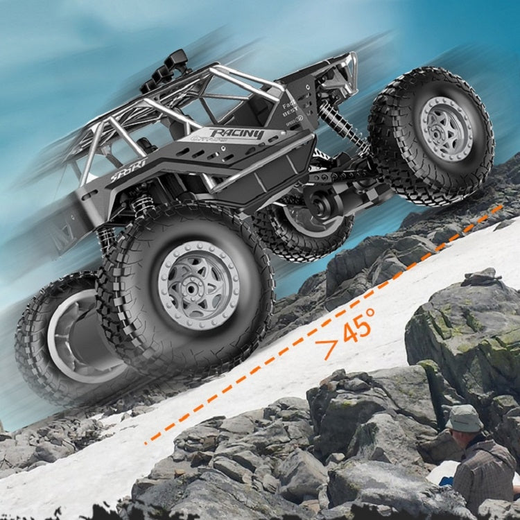 Alloy off-road RC toy car with suspension frame and four knobby tires.
