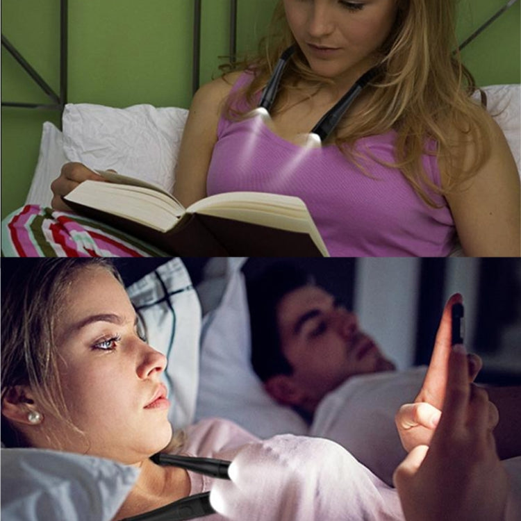 LED hanging neck reading lamp worn with light aimed toward an open book