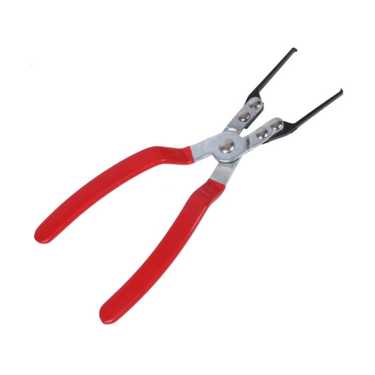 Red and silver relay extraction pliers with insulated handles and long claw jaws.