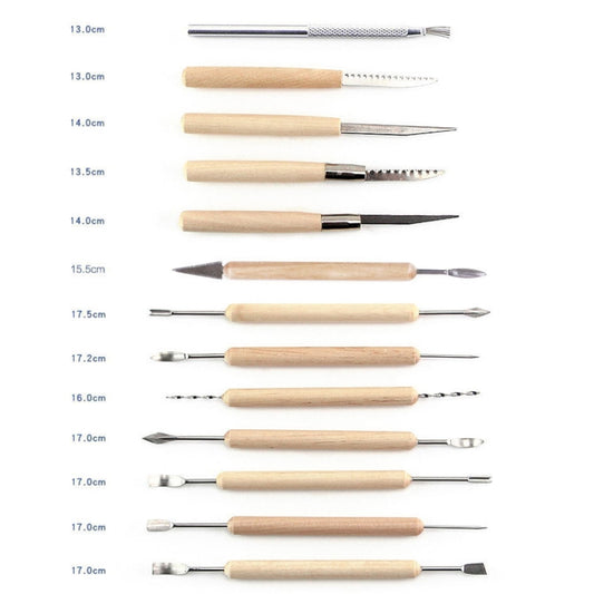 Clay sculpting tools close-up with light wood handles and metal tips in multiple sizes.