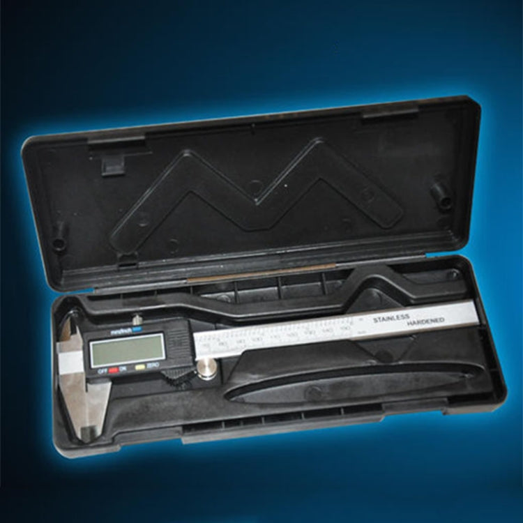 Digital vernier caliper in open case, stainless scale and LCD screen visible