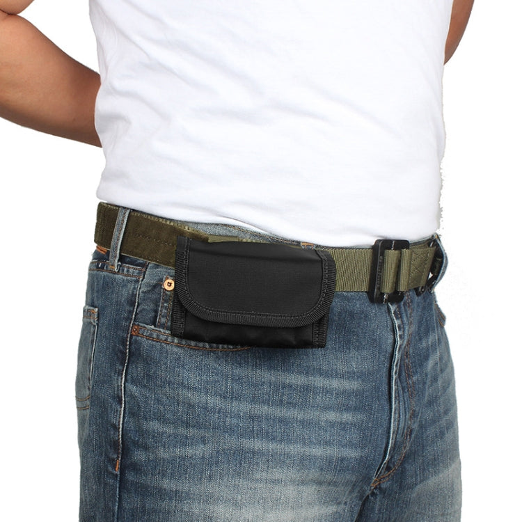 Black waist bag worn at the waist on blue jeans with adjustable buckle strap
