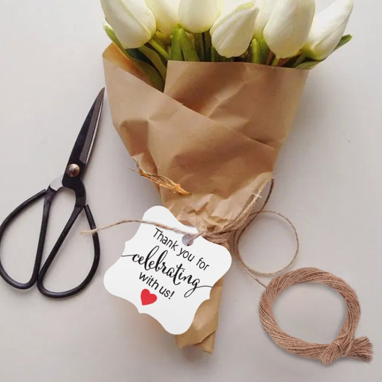 Kraft paper gift tag with 'Thank you for celebrating with us' text, tied with twine