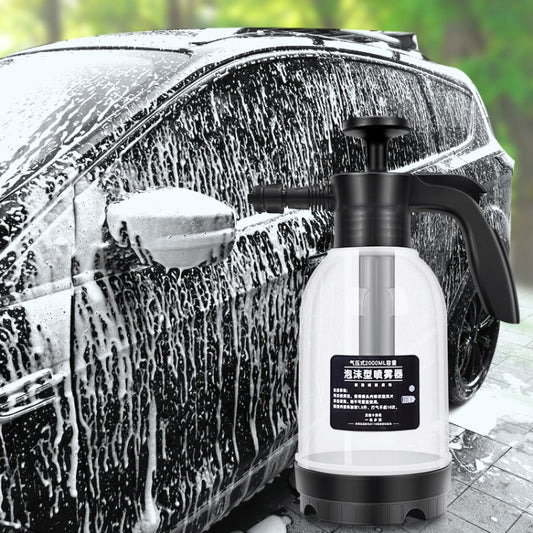 Handheld foam sprayer with black trigger and transparent white bottle, fan nozzle