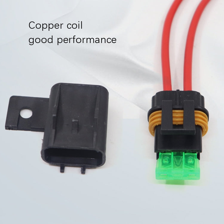 Pair of black waterproof fuse holders with red wire leads and green translucent blocks