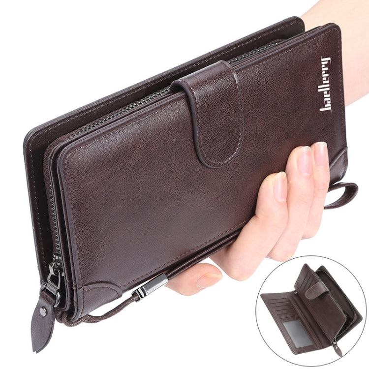 Dark brown leather-look wallet close-up with wrist strap and zip coin pocket