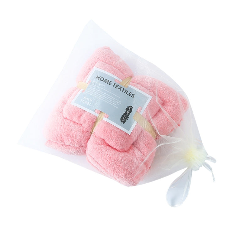 Pink coral fleece bath towel set packed with a clear cover and bow tie