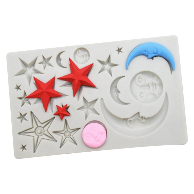 White silicone mold with star and crescent moon face cavities, with red and blue details