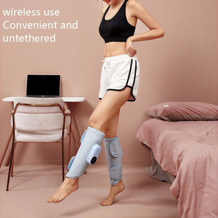 Blue wireless leg massager sleeve worn on ankle and calf with handheld control unit