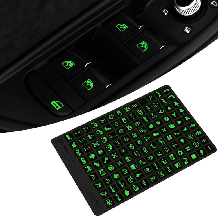 Car dashboard control panel with small green glowing sticker icons on buttons