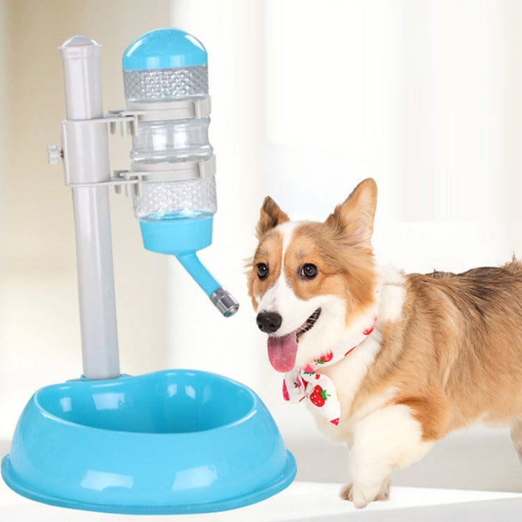 Blue automatic pet water dispenser next to a dog drinking from the bowl