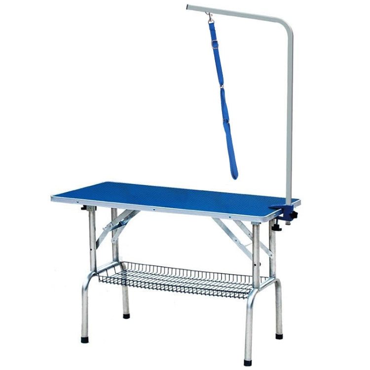 Blue dog traction rope hanging from pet bath table with metal clasp