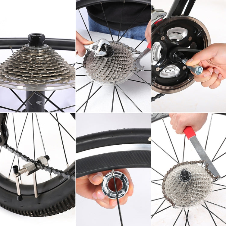 Bicycle cassette removal tool in use on rear wheel, lifting cassette off the hub