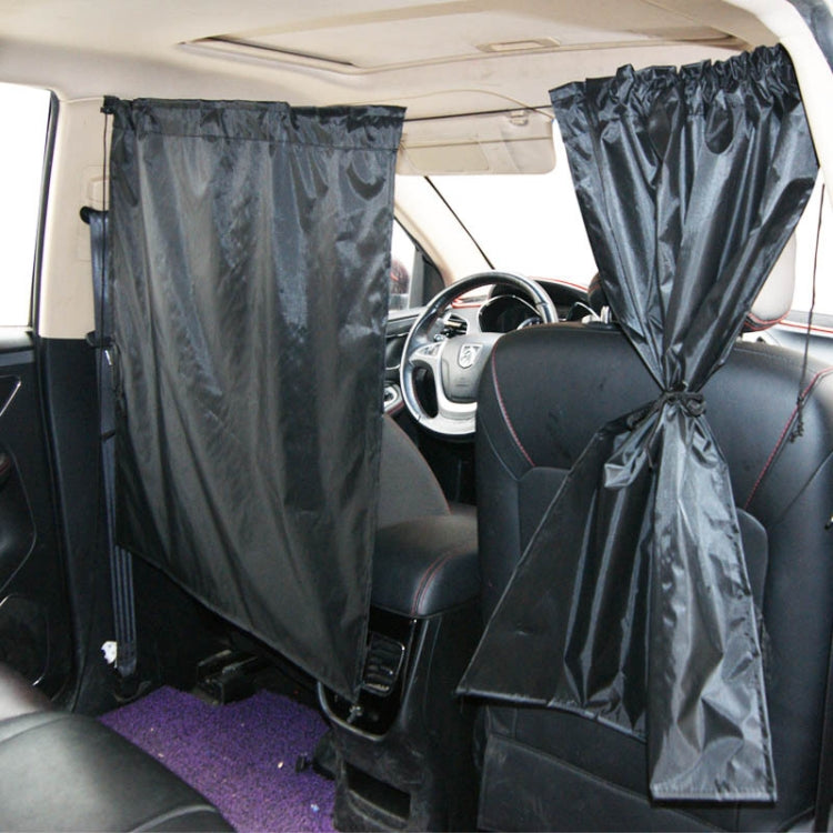 Black car privacy curtains hanging inside rear seats with side ties