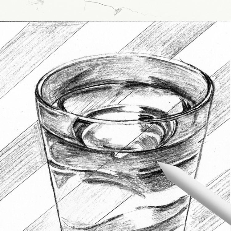 Blending tool tip smoothing charcoal strokes on paper near a mug of charcoal.