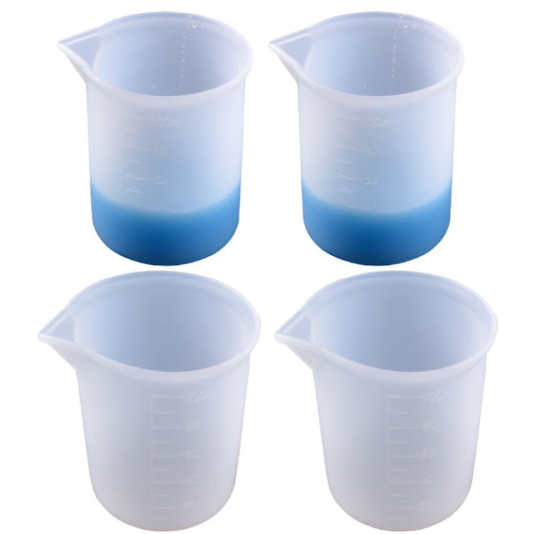 Translucent light-blue 100ml silicone measuring cups set, four cups with graduated scale