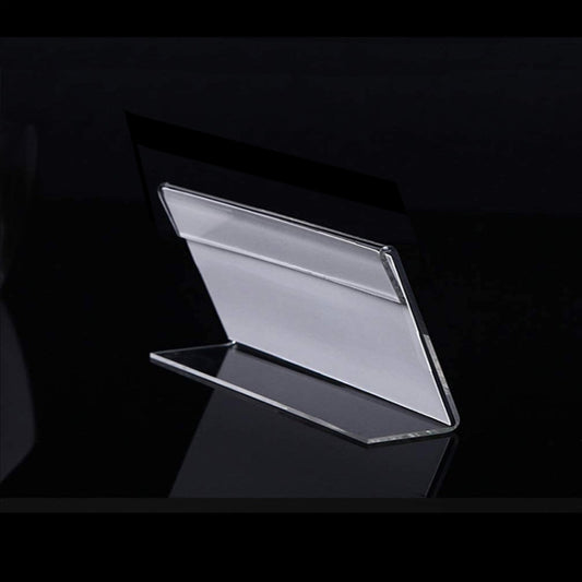 Clear acrylic label holder stand with angled V-shaped base for viewing