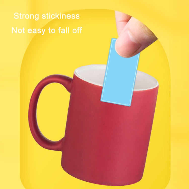 Children's square label stickers, blue sticker applied to a mug handle