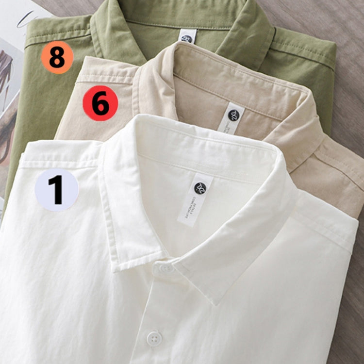 Clothing pieces with round numbered size label stickers for sorting
