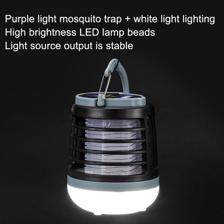 Black outdoor mosquito trap light with bright white bottom glow and hanging hook