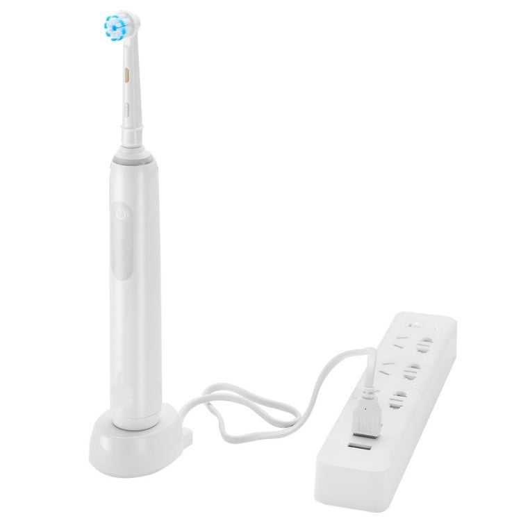 Charging cradle with toothbrush and USB-style power adapter with cable