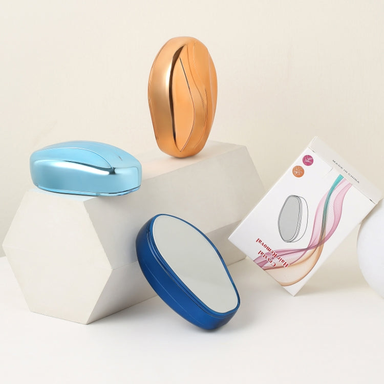 Manual epilator with glossy blue, bronze, and navy shells displayed