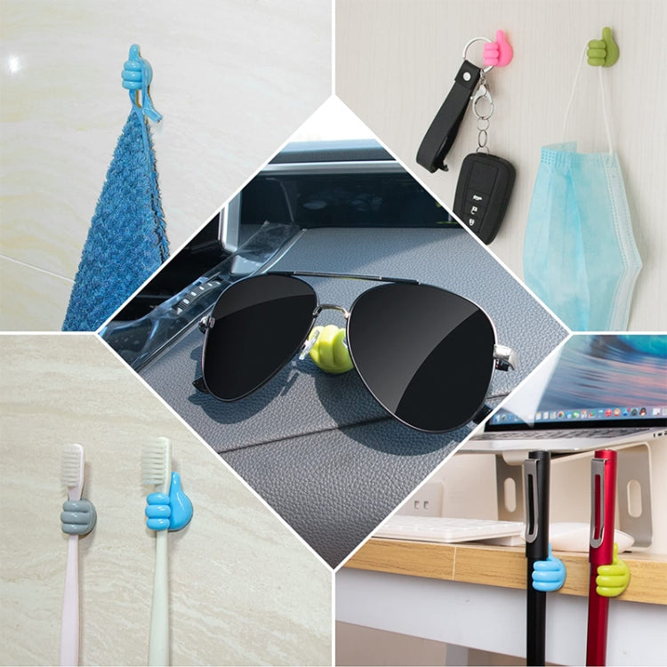 Adhesive thumb hook organizers for cords and small items, with blue and green hooks