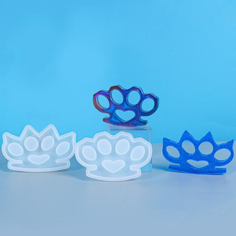 Set of paw-print silicone drop molds in multiple blue tones: white, light, and dark