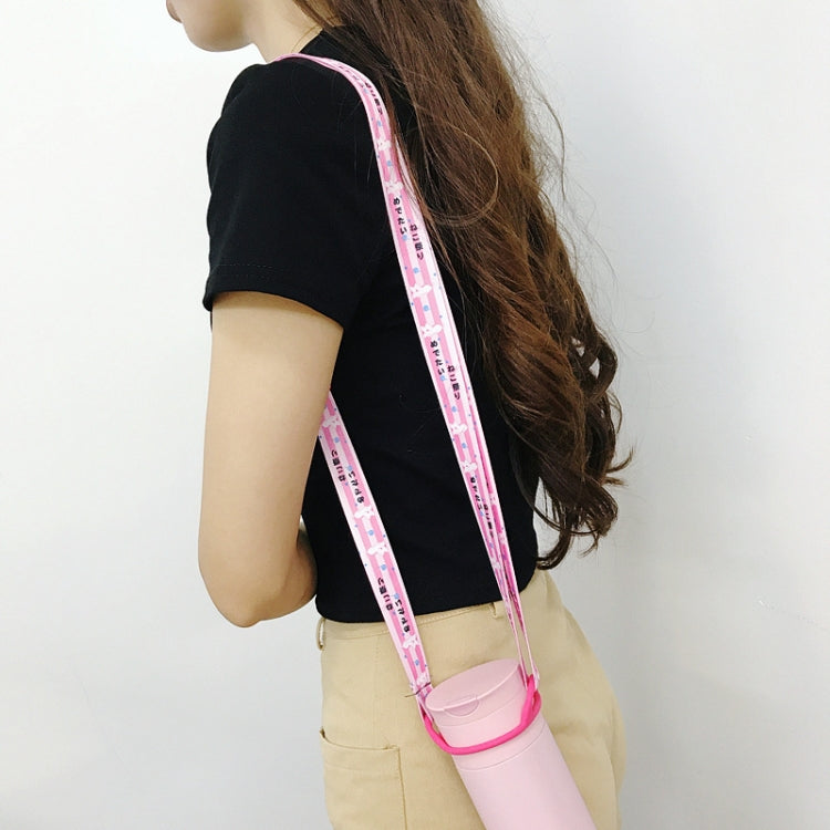 Person wearing a pink printed bottle lanyard with white cup holder strap