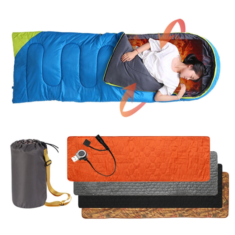 Portable heated sleeping pad shown stacked with carry pouch and use on a camper bed