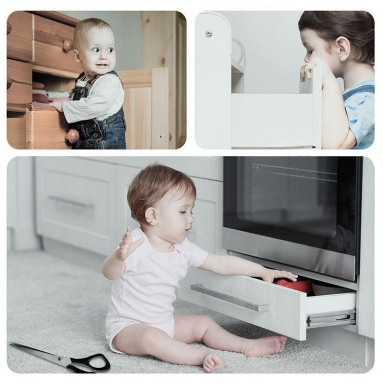 Child using a white safety lock on a cabinet to prevent access