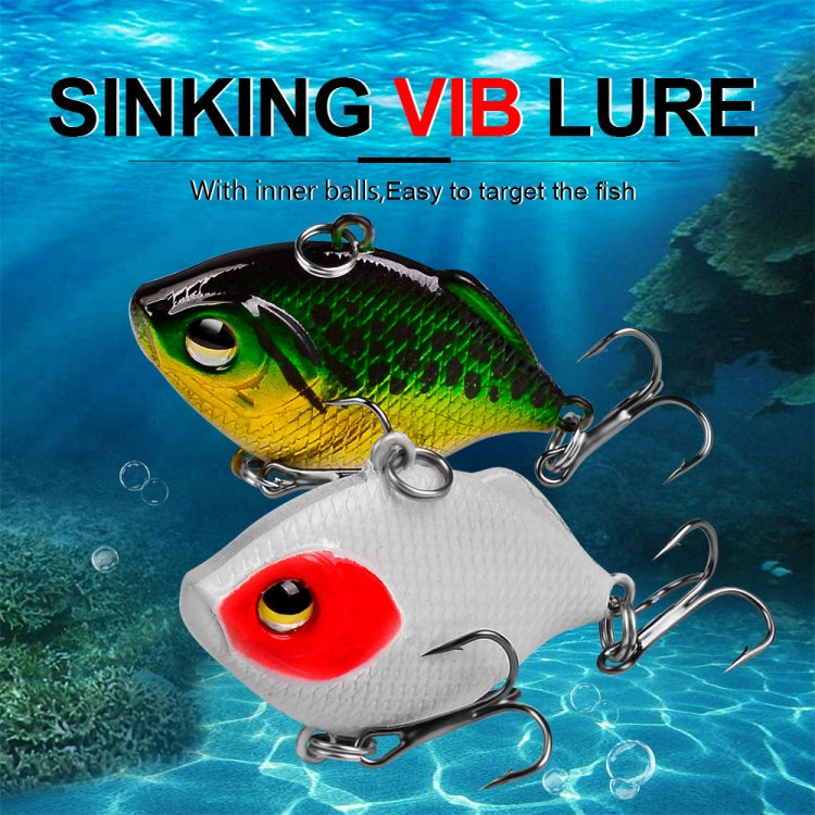 Two-tone plastic sinking VIB lure with large eye and treble hooks