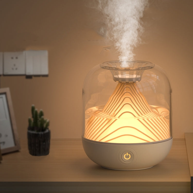 Mini USB ambient light humidifier with warm mountain LED glow and visible mist