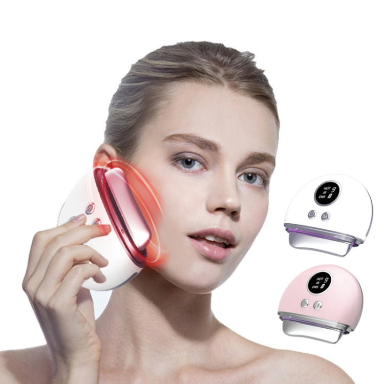 Facial microcurrent massager in pink and white held near face