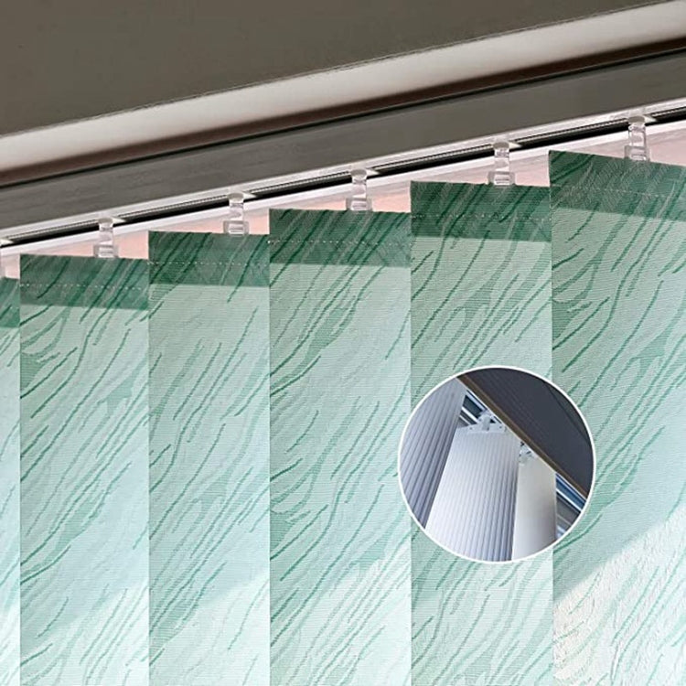 Vertical blinds held by white clips on a metal track, close-up view