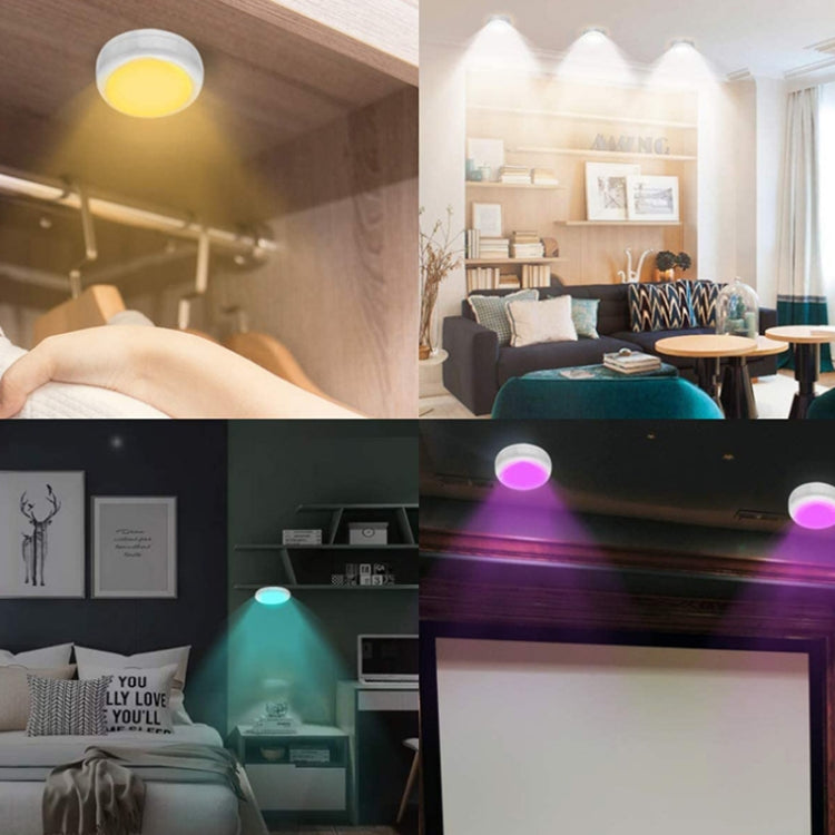 Under-cabinet RGB lights glowing purple and blue in a room
