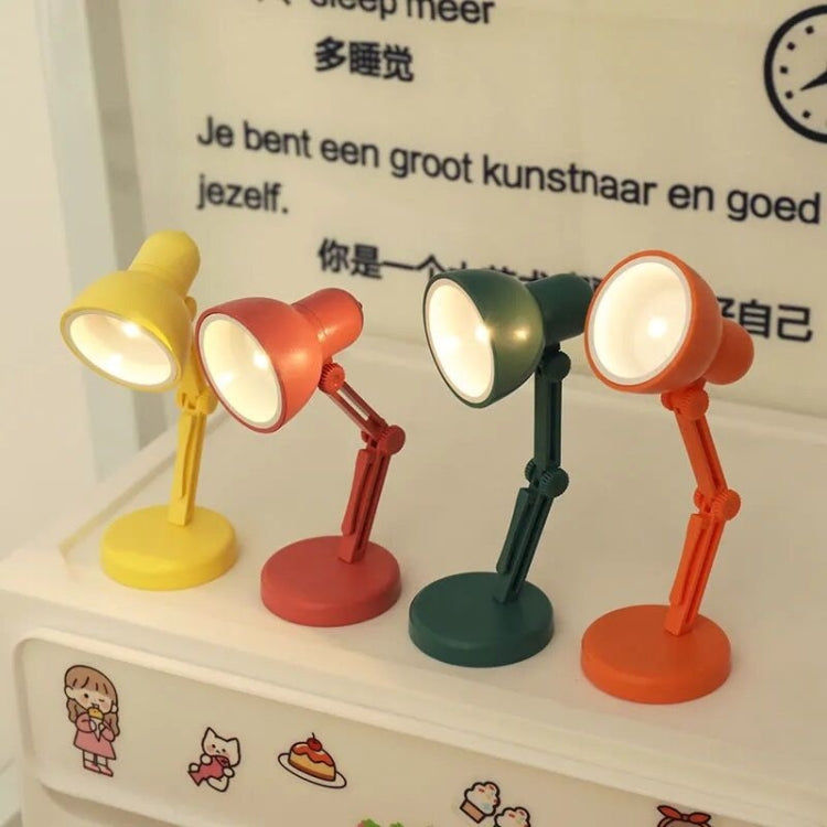 Mini magnetic LED desk lamps with foldable adjustable heads in yellow, red, green, orange