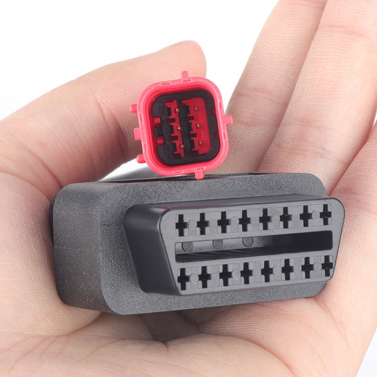 OBD adapter cable 16-pin port and red 6-pin connector on hand