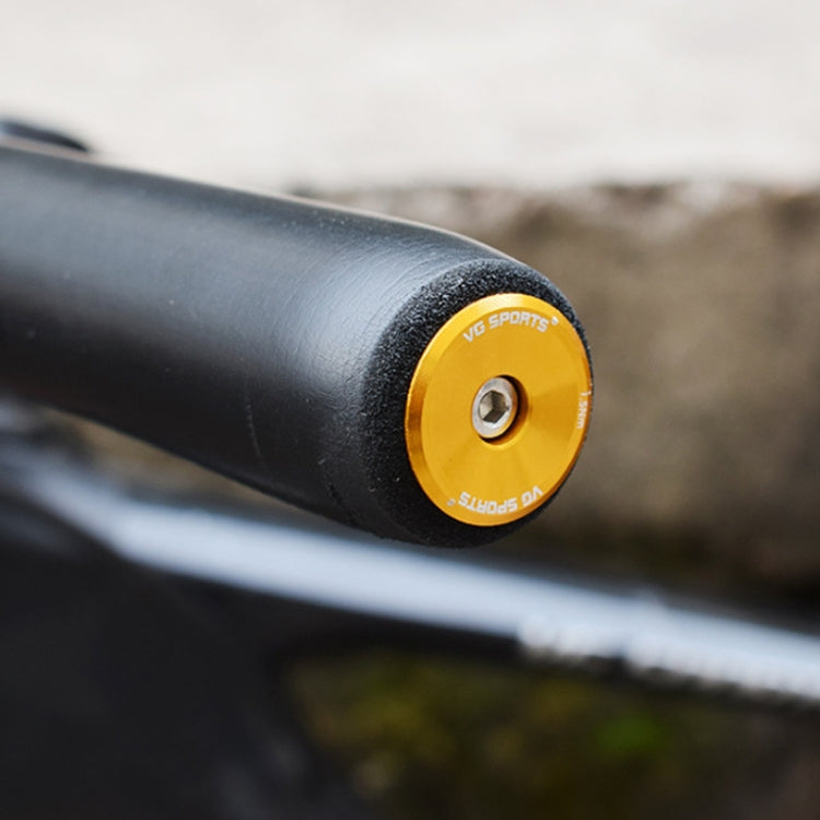 Bicycle handlebar expansion plug with black rubber and gold aluminum cap, VG SPORTS logo